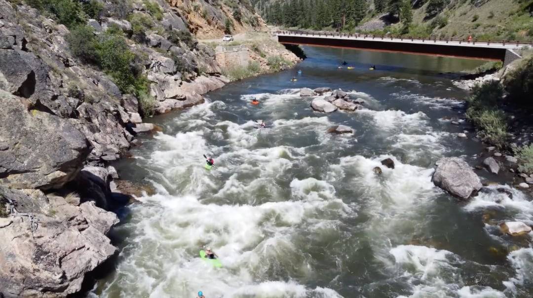 a group of kayakers on the salmon river