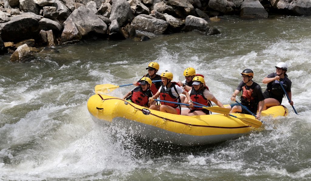 A group of people whitewater rafting on the Salmon River