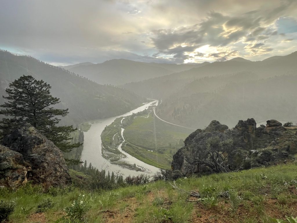 Scenic view of the Salmon River winding through rugged mountain terrain.