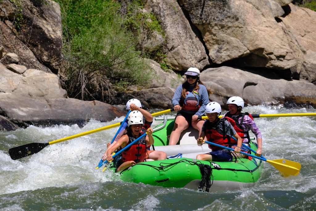 Raft paddling into a rapid on the Salmon River.