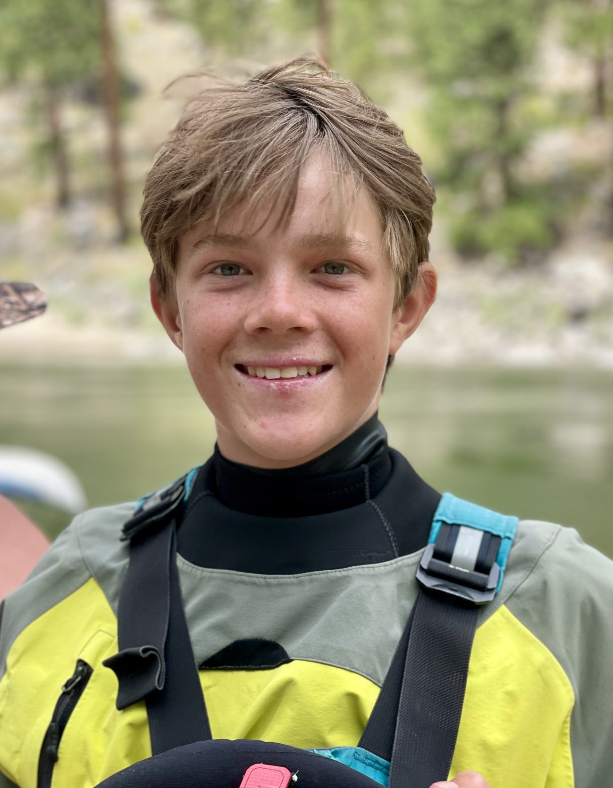 Kayaking instructor posing along the Salmon River shoreline