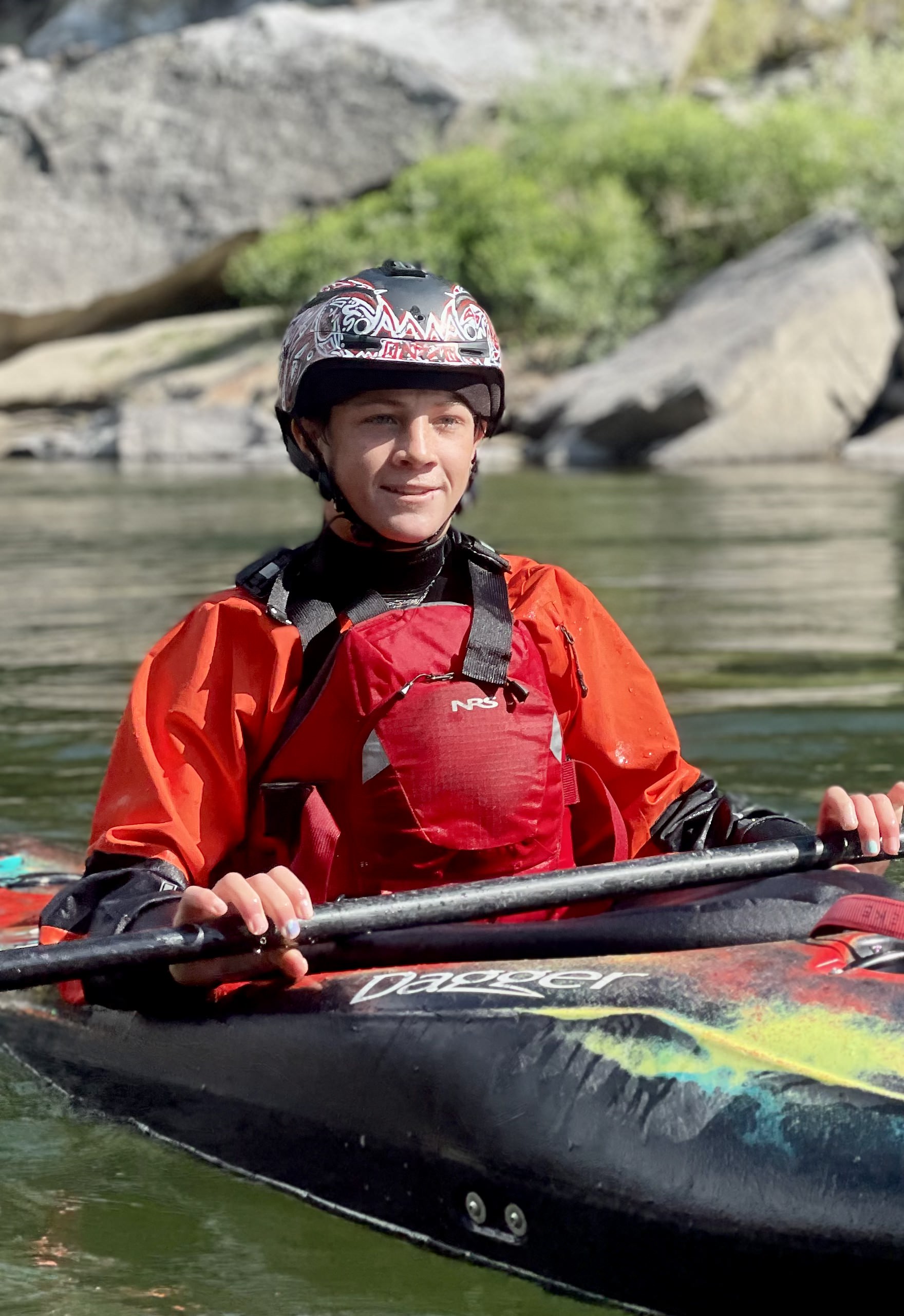 Guide enjoying a quiet stretch of river between rapids.
