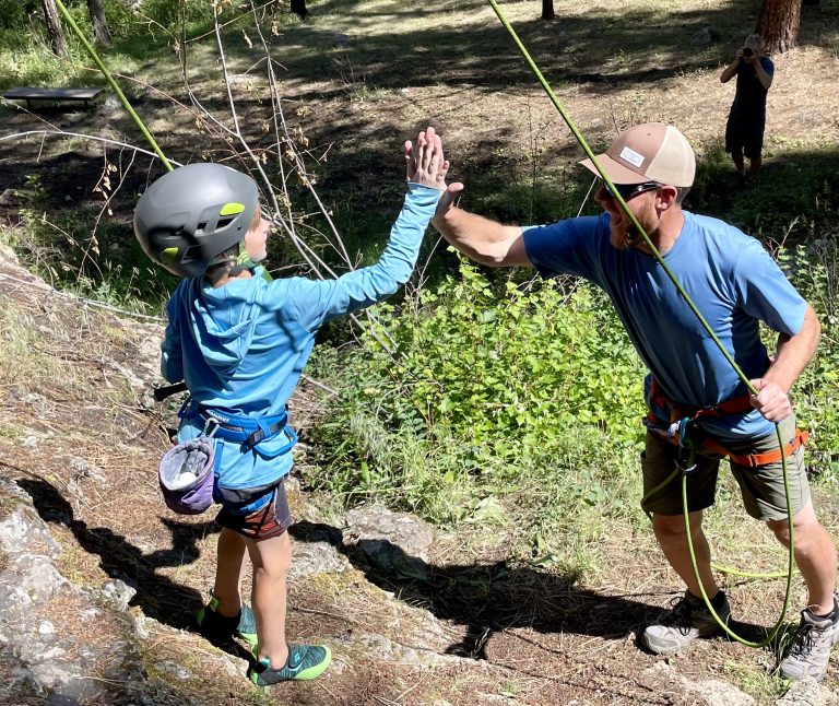 high five after a fun guided rock climbing activity near the salmon river